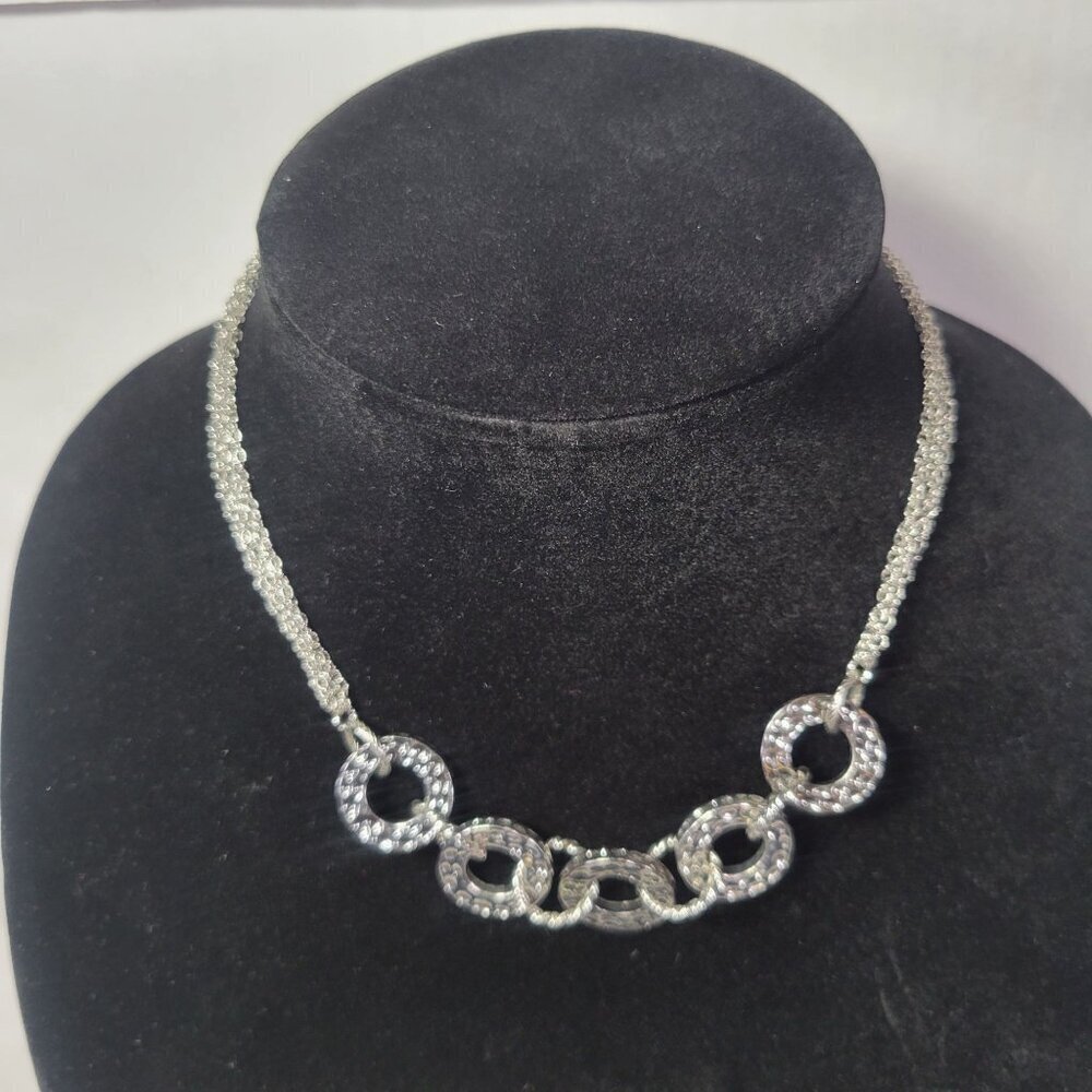 Silver-Toned Lia Sophia Multi-Strand Necklace With Circular Textured Pendant